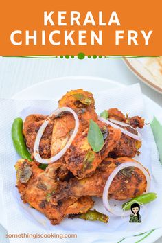 chicken fry is served on a white plate with green peppers and onions, next to some pita bread