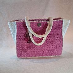 **Handmade Large Capacity Bag with Pink Wooden Accessories** This elegant and stylish handmade bag is the perfect choice for every occasion, from daily use to a day at the beach! 🌸  The soft pink tones and pink wooden accessories offer a chic look, while the large capacity allows you to carry all your essentials with ease. Carefully crocheted with durable threads, this bag is both lightweight and practical. Being handmade, it carries a unique character. If you're looking to reflect your style w Colorful Tote Bags, Wooden Accessories, Eco Friendly Bags, Pink Accessories, Tote Bags Handmade, Summer Bag, Style Pink, Handmade Bag, Pink Tone