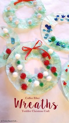 three wreaths made out of plastic plates with pom - poms on them