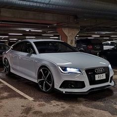 an audi car parked in a parking garage