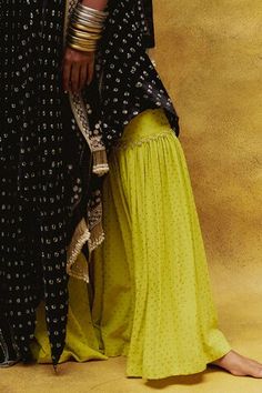 Black handkerchief kurta with all over bandhani prints. Paired with a neon yellow gharara with butti work and embroidered dupatta. - Aza Fashions Floor-length Chikankari Embroidery Sharara, Navratri Sharara With Dabka, Yellow Dabka Sharara, Yellow Gharara, Black Handkerchief, Women Kurta, Embroidered Dupatta, Neon Yellow, Aza Fashion