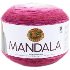 a pink ball of yarn with the words mandala on it's side