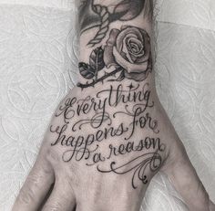 a person's hand with a rose on it and the words everything happens for reason