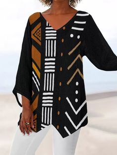 Look fabulous in this stylish comfortable long sleeve v-neck African bogolan printed t-shirt. This stunningly beautiful shirt can be matched with all types of  shirts and pants and is versatile for many occasions. Compliments all body shapes and sizes. -Regular fit -Long Sleeve -100% polyester -Fabric weight: 115g/m2 African Tops For Women, African Tops, Shirts And Pants, African Print Tops, Cloth Design, African Shirts, African Mud Cloth, Cloth Material, Beautiful Blouses