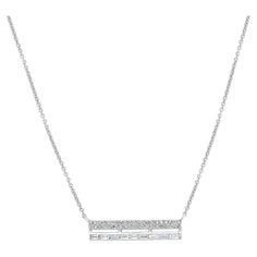 In a 14K White Gold setting, a magnificent diamond rectangular bar pendant necklace is fastened. The 0.24 carat round single-cut and baguette full-cut diamonds in this necklace are elegantly placed in the bar motif. This necklace, which comes with a gold chain, can be the ideal gift for your loved ones. Please follow the Luxury Jewels storefront to view the latest collections & exclusive one of a kind pieces. Luxury Jewels is proudly rated as a Top Seller on 1stDibs with all 5 star customer revi Diamond Bar Necklace, Pearl Chain Necklace, Bar Pendant Necklace, Diamond Bar, Bar Pendant, Diamond Drops, Chain Necklaces, 3 Carat, Pearl Chain