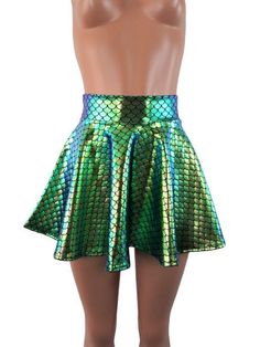 "Please measure yourself to make sur u order the correct length Iridescent Black gold color changing , small round mermaid scale print spandex skater skirt 15\" shown on mannequin.High waist skirt can be worn lower or higher most skirts allow you to place the waistline where it suits you on your particular body shape and personal desire! this fun flirty skirt is a full circle design and can be ordered in lengths of 10 inch, 12 inch, 15 inch and 19 inch- if you need a longer length contact me for Stretch Mermaid Skirt For Party, Fitted Green Mermaid Bottoms, Green Fashion Outfits, Vivian Dress, Rave Skirt, Skirt Circle, Iridescent Mermaid, Led Clothing, Iridescent Black