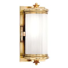 a wall light with a white glass shade on the front and gold trimmings