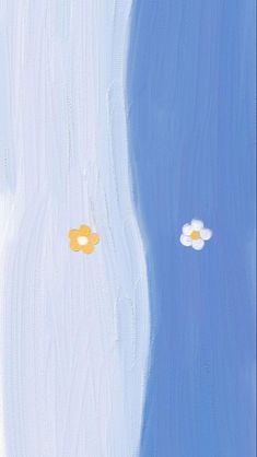 two yellow flowers are floating in the blue water and one is on its own side