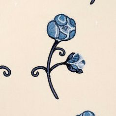 a blue flower on a white background with swirls