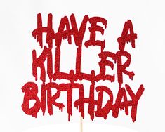 there is a red cake topper that says have a killer birthday on it,