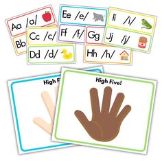 four cards with different types of words and pictures on them, including the letter f