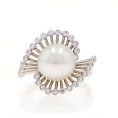 Size: 4 1/2 Sizing Fee: Up 3 sizes for $60 or Down 1/2 a size for $40 Metal Content: 14k White Gold Stone Information Akoya Pearl Size: 10mm Natural Diamonds Carat(s): .32ctw Cut: SIngle Color: F - G Clarity: VS1 - VS2 Total Carats: 0.32ctw Style: Solitaire with Accents Bypass Theme: Wave Swirl Measurements Face Height (north to south): 11/16" (17mm) Rise Above Finger: 1/2" (12.6mm) Weight: 6.2 Grams Stamps: 14k Condition: Pre-Owned Professionally cleaned, polished, and tested to guarantee metal content. Silver Jewelry Box, Bypass Ring, Gold Stone, Akoya Pearls, Pearl Diamond, Pearl Size, Womens Engagement Rings, Diamond Gemstone, Cocktail Rings