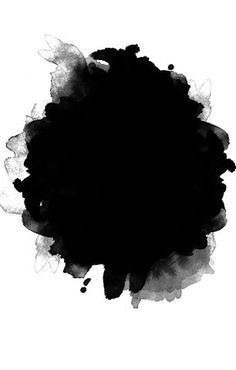 a black ink spot on a white background