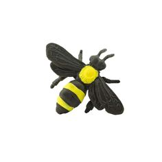 a black and yellow stuffed bee on a white background with the words, honey written below it