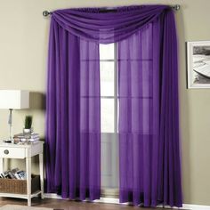 purple sheer curtains hanging in front of a window