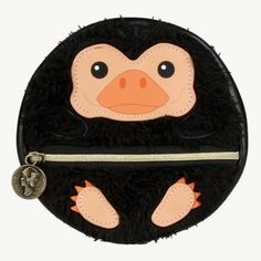 a black coin purse with an animal face on it