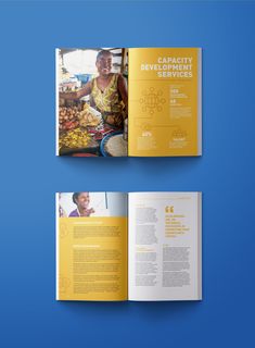 the brochure is open to show an image of people cooking and selling food