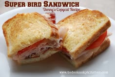 there is a sandwich cut in half on a plate with the words super bird sandwich