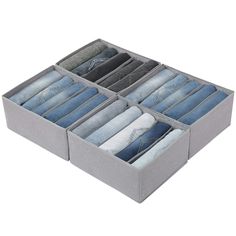 six pairs of blue jeans are in a gray box on a white background, with the bottom section folded open