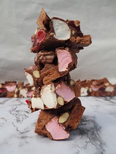 a stack of rocky road treats with the words tim tam on top and above it