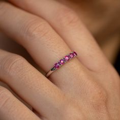 A stacking 5 stone ruby ring in 14K solid white gold. It is ideal for an anniversary gift for women or for an alternative wedding band. This ruby cluster is also a great birthday gift, because ruby is the July birthstone. 100% handcrafted with love! PRODUCT DETAILS ● Material : 14K solid gold - white gold - rose gold ● Gemstones: 5 Rubies natural ● Ruby's Diameter: 2.5mm ● Rubies Weight: 0.41ct ● Gemstones shape: Round/ Brilliant cut RING SIZING For General Reference: ● we use standard US Ring S Formal Lab-created Ruby Ring With Round Band, Formal Ruby Stackable Rings, Classic Stackable Ruby Ring With Round Cut, Lab-created Ruby Promise Ring With Round Band, Formal Ruby Stackable Rings Fine Jewelry, Fine Jewelry Stackable Ruby Promise Ring, Ruby Stackable Promise Ring, Elegant Stackable Ruby Promise Ring, Elegant Stackable Ruby Ring For Promise