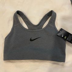 Size S New Gray Nike Sports Bra Nike Solid Color Sports Bra, Nike Gray Activewear For Sports Events, Nike Gray Activewear For Workout, Nike Athletic Heather Activewear For Gym, Nike Sporty Gray Activewear, Sporty Gray Nike Activewear, Gray Athleisure Sports Bra, Nike Athletic Heather Activewear For Workout, Nike Athleisure Activewear In Athletic Heather