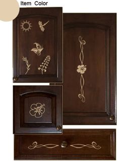 some brown cabinets with white designs on them