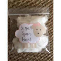 a package of sugar sprinkled wool with a sheep on it