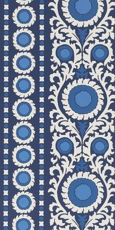 a blue and white striped wallpaper with an ornate design on the bottom half of it