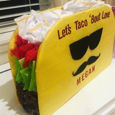 a taco shaped like a man with sunglasses and a moustache on it