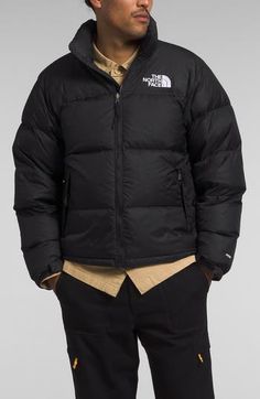 A retro North Face jacket based on a baffle-quilted, down-insulated design from 1996 offers unmatched warmth in cold weather. The durable ripstop shell with warm, lightweight insulation is perfect for backpacking thanks to its packable design that can be stowed in its own pocket. 26" length (size Medium) Front zip closure Stand collar; stowaway drawcord hood Adjustable hook-and-loop cuffs Front zip pockets; interior zip pocket Packs into pocket 40-denier 57 g/m² ripstop taffeta with non-PFC dura The North Face Nylon Puffer Jacket, The North Face Down Puffer Jacket, The North Face Down Puffer Jacket With Padded Collar, The North Face Long Sleeve Down Puffer Jacket, The North Face Puffer Jacket For Streetwear, Casual The North Face Nylon Puffer Jacket, The North Face Streetwear Puffer Jacket, Casual Nylon Puffer Jacket By The North Face, Casual The North Face Puffer Jacket For Outdoor