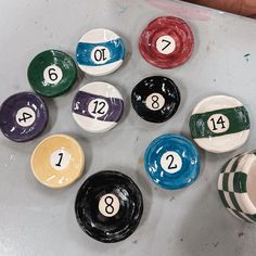 eight ball numbers are arranged on top of each other