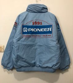 "Vintage 1991 Pioneer Paris Tripoli Dakar Rally Jacket Pre-owned: Good condition Size on Tag s Measurement Pit to pit 24.5\" Length 26.5\" I do combined shipping" Retro Winter Motorcycle Outerwear, Retro Winter Motorcycling Outerwear, Winter Racing Streetwear Outerwear, Winter Racing Style Streetwear Outerwear, Racing Style Winter Outerwear For Streetwear, Jacket Vintage, Red Puffer Jacket, Suede Fringe Jacket, Corduroy Blazer