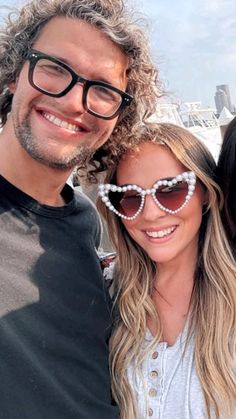 two women and a man posing for a photo