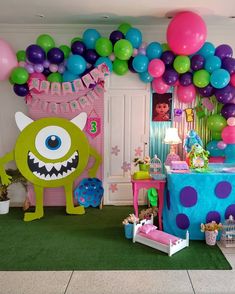 a birthday party with balloons and decorations