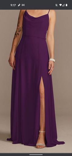 a woman in a long purple dress