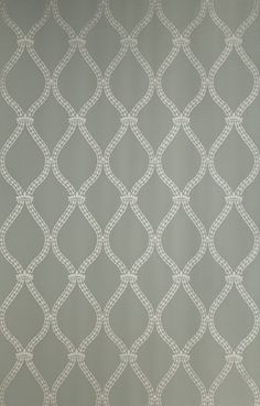 a gray and white wallpaper with an intricate design on it's side,