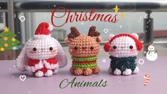 three small crocheted animals sitting next to each other on top of a table