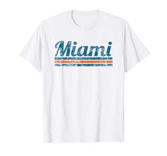 a white t - shirt with the word miami in blue, orange and green stripes