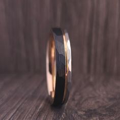 Hammered Black Silver and Rose Gold Tungsten Wedding Band Ring for Men Women, Black Obsidian Hammered Ring, Rose Gold Ring Band, 4mm 6mm 8mm ➵ Elegant Black and Silver Hammered Tungsten Carbide Ring with Rose Gold Groove in Comfort Fit. ➵ Black and Silver Hammered Brushed Finish outside and High Polished Rose Gold Inside. ➵ Our Tungsten Carbide rings are Cobalt Free and Hypoallergenic. ➵ Tungsten Carbide is extremely scratch resistant, and is the hardest metal for use in jewelry. Tungsten Carbid Gold Tungsten Wedding Bands, Gold Ring Band, Rose Gold Band Ring, Rose Gold Tungsten, Tungsten Wedding Band, Hammered Ring, Hammered Rings, Hard Metal, Tungsten Wedding Bands