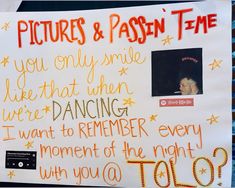 a sign posted on the side of a building that says pictures & passion time you only smile like that then dancing i want to remember every moment of the night with you