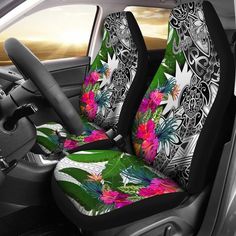 the interior of a car with colorful flowers on it