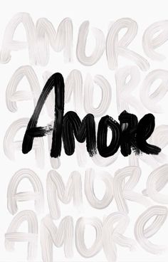 the words amore are painted in black and white