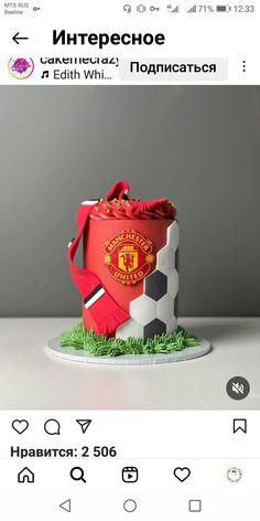 the cake is decorated with an image of a soccer ball and a bag on it