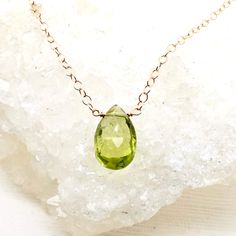 Sparkly Peridot briolette stone, suspended on a rose or yellow gold-filled or sterling silver chain. The perfect August gift for your special person. Worn alone or layered with your favorite chains. The light green color is just beautiful. genuine Peridot Approx. 1-carat+ 10 x 6 mm -sizes vary, most are larger Pear Briolette Light yellow-green (lime green) - varies Transparent with eye-visible inclusions Made to Order - Production time is 1-7 days depending on quantity Order :: select metal pref Yellow Gold Briolette Necklace For May Birthstone, Faceted Peridot Necklaces As Gift, Faceted Peridot Necklaces For Gift, Gift Peridot Faceted Necklaces, Yellow Gold Peridot Necklace Gift, Teardrop Peridot Jewelry For May Birthstone, Peridot Briolette Gemstone Jewelry, Yellow Gold Drop Necklaces For May Birthstone, Yellow Gold Drop Necklace For May Birthstone