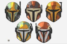 four different colored helmets are shown in this image