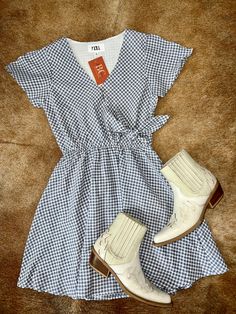 Get ready to turn heads in The Joan Dress! This stunning sundress features a beautiful checkered print and a flattering V-neck design. With short sleeves and a side tie, this above-the-knee dress is perfect for any occasion. Make a statement and feel confident in The Joan Dress! Country Kids, Big Country, Checkered Print, Knee Dress, Country Western, Cowboy And Cowgirl, Dress Romper, Western Wear, Feel Confident