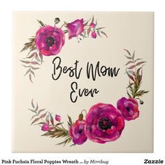 a tile with the words best mom ever written in black ink and painted pink flowers