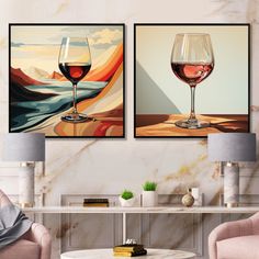 two wine glasses sitting on top of a table in front of a wall mounted painting