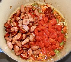 the food is prepared and ready to be cooked in the pot on the stove top